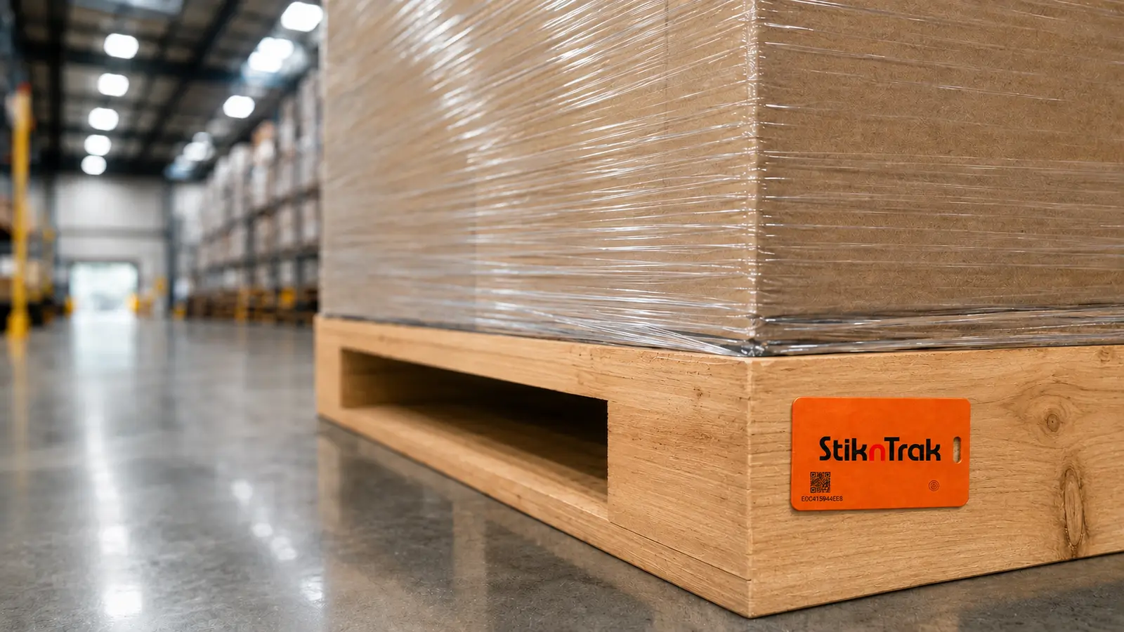 Illustrative application showing the orange StiknTrak SNT-FM36 mounted flush to a flat wooden pallet bearer